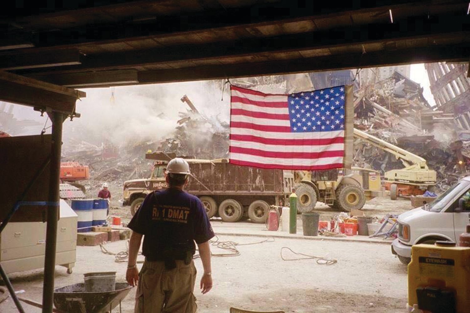 AT GROUND ZERO: A member of the Rhode Island Disaster Medical Assistance Team looks out at a portion of “the pile” at Ground Zero in Manhattan during the response to the attacks.